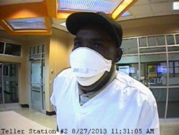 The man who robbed the UT Federal Credit Union on Tuesday was described as in his late 40s to early 50s, weighing 180 to 190 pounds and between 6 feet to 6 feet 2 inches tall in a press release from the FBI. Photo from the FBI.