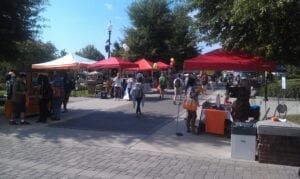 The “Unwind Before You Unravel” VolAware Street Fair booths and volunteers on Pedestrian Walkway