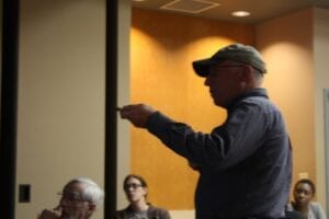 Paleontologist Don Goldstein speaks to a crowd Friday at the UT Science Forum.