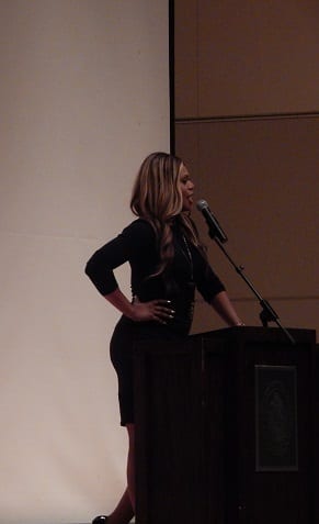 A question-and-answer session followed Cox's speech. Cox answered questions about womanism, fashion, meeting the Obama family and receiving gifts from Beyoncé.