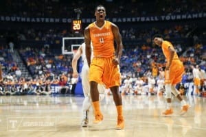 NASHVILLE,TN - MARCH 10, 2016 - Forward Armani Moore #4 of the Tennessee Volunteers celebrates during the SEC Basketball Tournament game between the Vanderbilt Commodores and the Tennessee Volunteers at Bridgestone Arena in Nashville, TN. Photo By Craig Bisacre/Tennessee Athletics