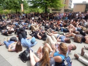 Students chanted while they performed the die-in.
