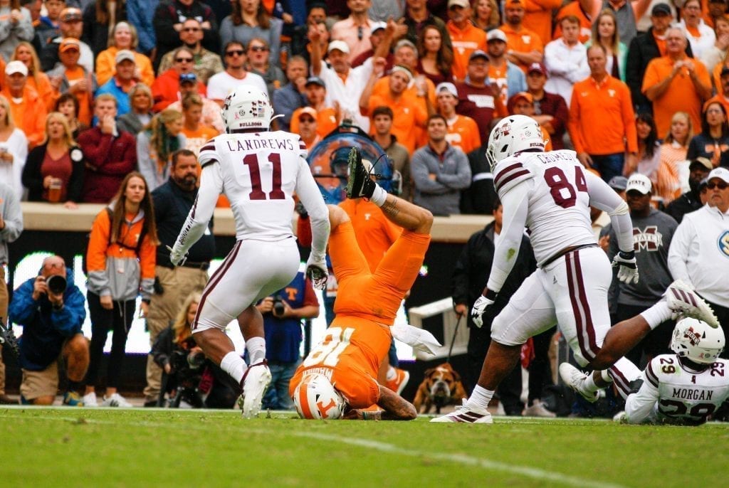 Tennessee quarterback Brian Maurer (18) falls head first receiving a concussion on Oct. 12, 2019 in Knoxville, Tennessee. Photo/ Ben Gleason