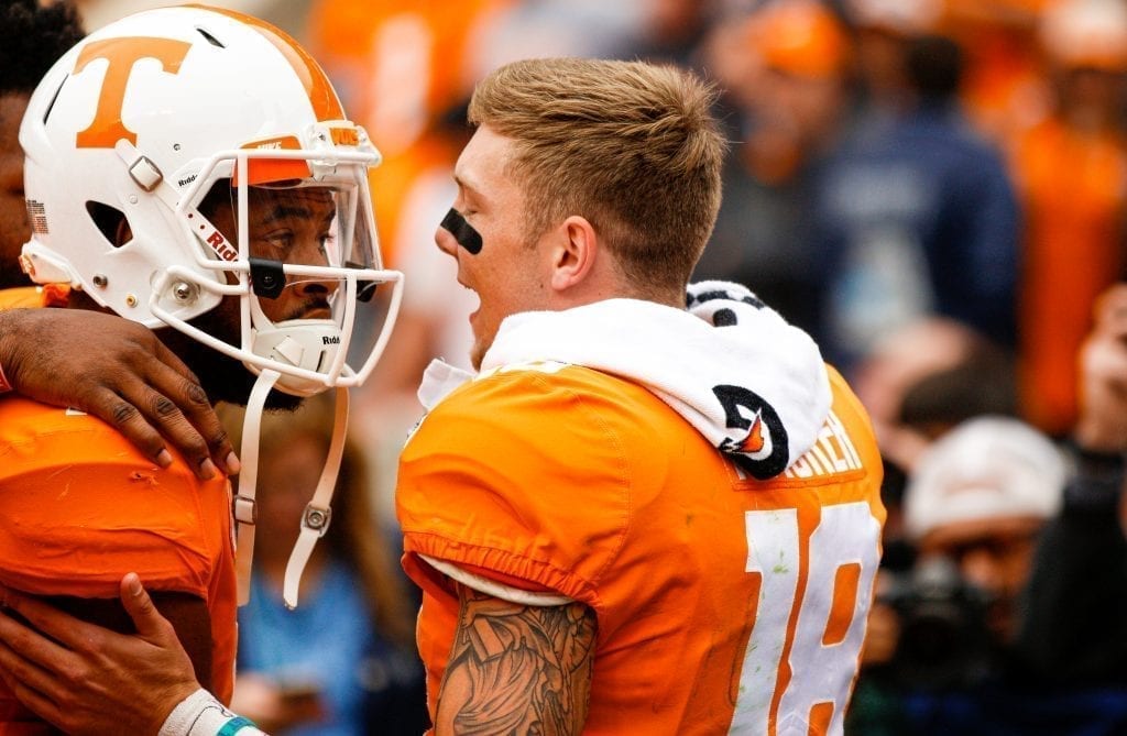 Tennessee quarterback Brian Maurer (18) talks to a teammate after a win versus Mississippi State on Oct. 12, 2019 in Knoxville, Tennessee. Photo/ Ben Gleason
