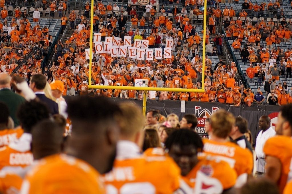 Tennessee fans hold up letters in the stands when Tennessee played Indiana in the Tax Slayer Gator Bowl on Jan. 1, 2020. Photo/ Ben Gleason